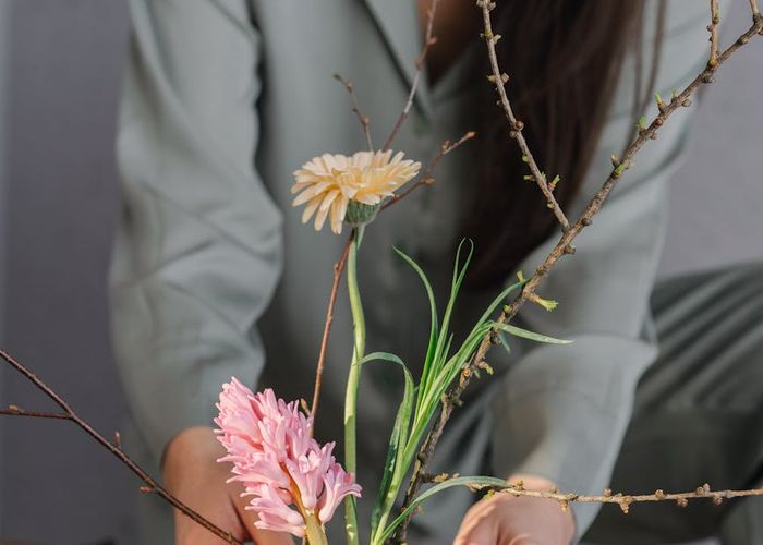 Person feeling serene and balanced in a bright room.